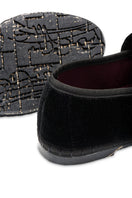 Flabelus Sophie black flats with black piping and buckle closure, featuring a sleek design and comfortable slip-on style.