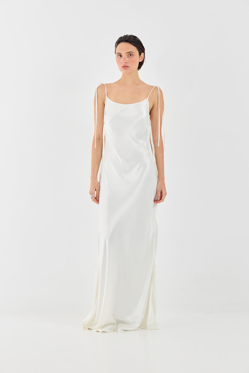 White Sophie maxi dress by Tamar Keburia, flowing fabric with elegant design, showcased in a full-length image.