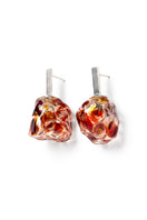 Salvára SOPLO M amber earrings featuring sleek red design and modern style, shown on a plain background.