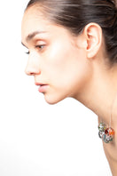 Multicolor SOPLO necklace by SALVÁREA featuring multiple layered chains and vibrant beads for a bold, stylish look.