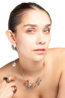 Colorful multicolor SOPLO necklace by SALVÁREA featuring layered chain design with vibrant beads and mixed textures.