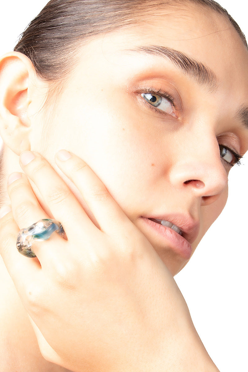 Salvárea Soplo Ring Set featuring multiple blue rings with intricate designs, displayed on a neutral background.