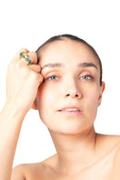 Salvárea Soplo Ring Set featuring green rings with intricate designs, showcasing multiple rings on a white background.