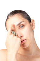 Green SALVÁREA Soplo Ring Set featuring multiple stylish rings with intricate designs on a white background.