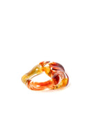 Salvárea Soplo Ring Set featuring vibrant red rings with intricate designs, perfect for stylish jewelry accessories.