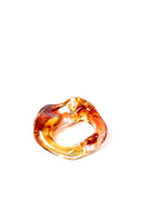 Red SALVÁREA Soplo Ring Set featuring multiple stylish rings with intricate designs and a vibrant finish.