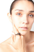 Salvária Soplo Ring Set featuring stylish smoke-colored rings with intricate designs on a white background.