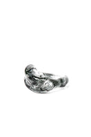 Salvárea Soplo ring set featuring smoky, oxidized finish with multiple interconnected rings for a stylish jewelry look.