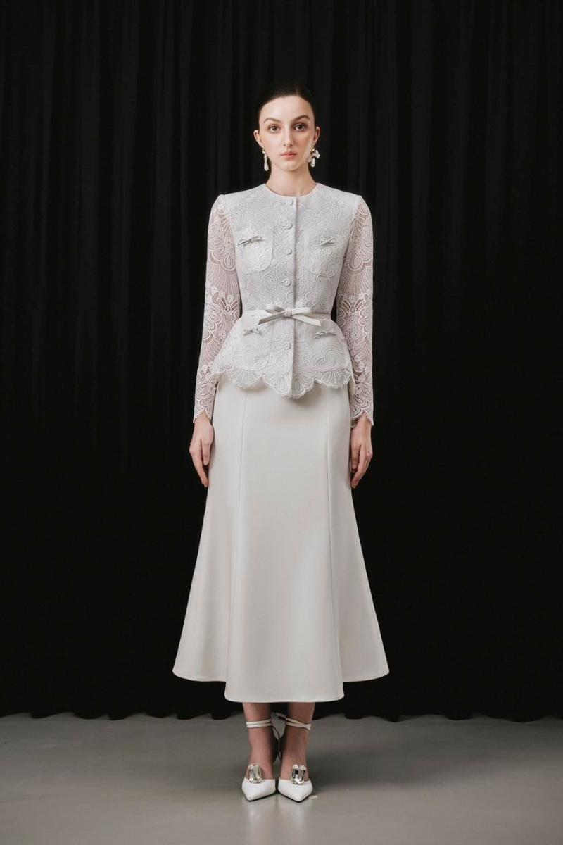 White Plan SOVEN top and NOVEN skirt co-ord set, featuring a stylish matching outfit with a fitted top and flowing skirt.