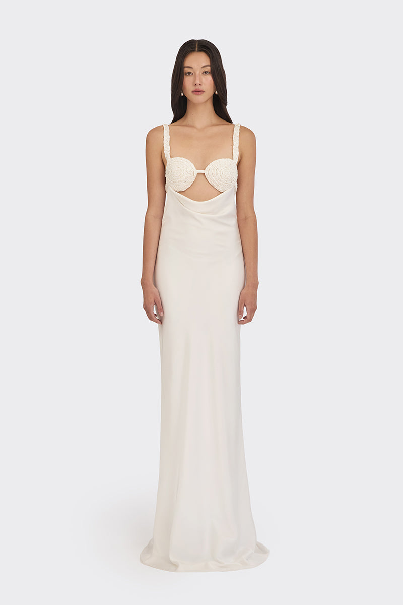 Off-white spiral cowl maxi dress by Stolen Stores, flowing fabric with elegant drape and cowl neckline, perfect for summer or formal events.