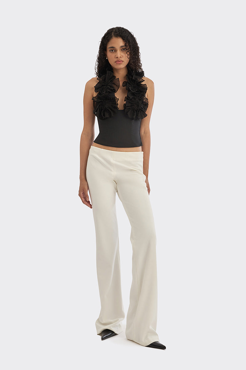 Black Lotus Leaf Mini Top by Stolen Stores featuring a spiral leaf corset design, perfect for stylish casual wear.