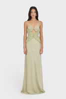 Green spiral lotus leaf maxi dress by Stolen Stores, flowing fabric and elegant design perfect for summer or special occasions.