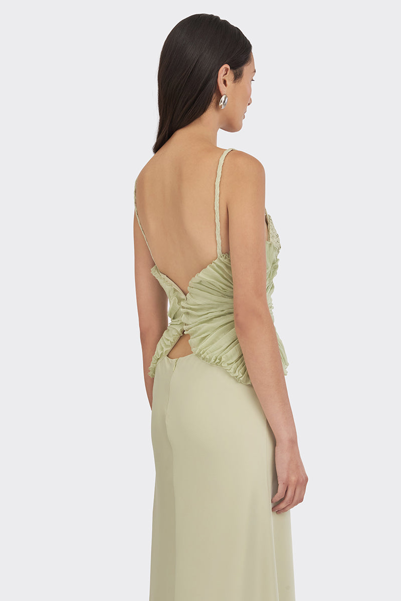 Green spiral lotus leaf maxi dress by Stolen Stores, flowing fabric and elegant design perfect for summer or formal occasions.