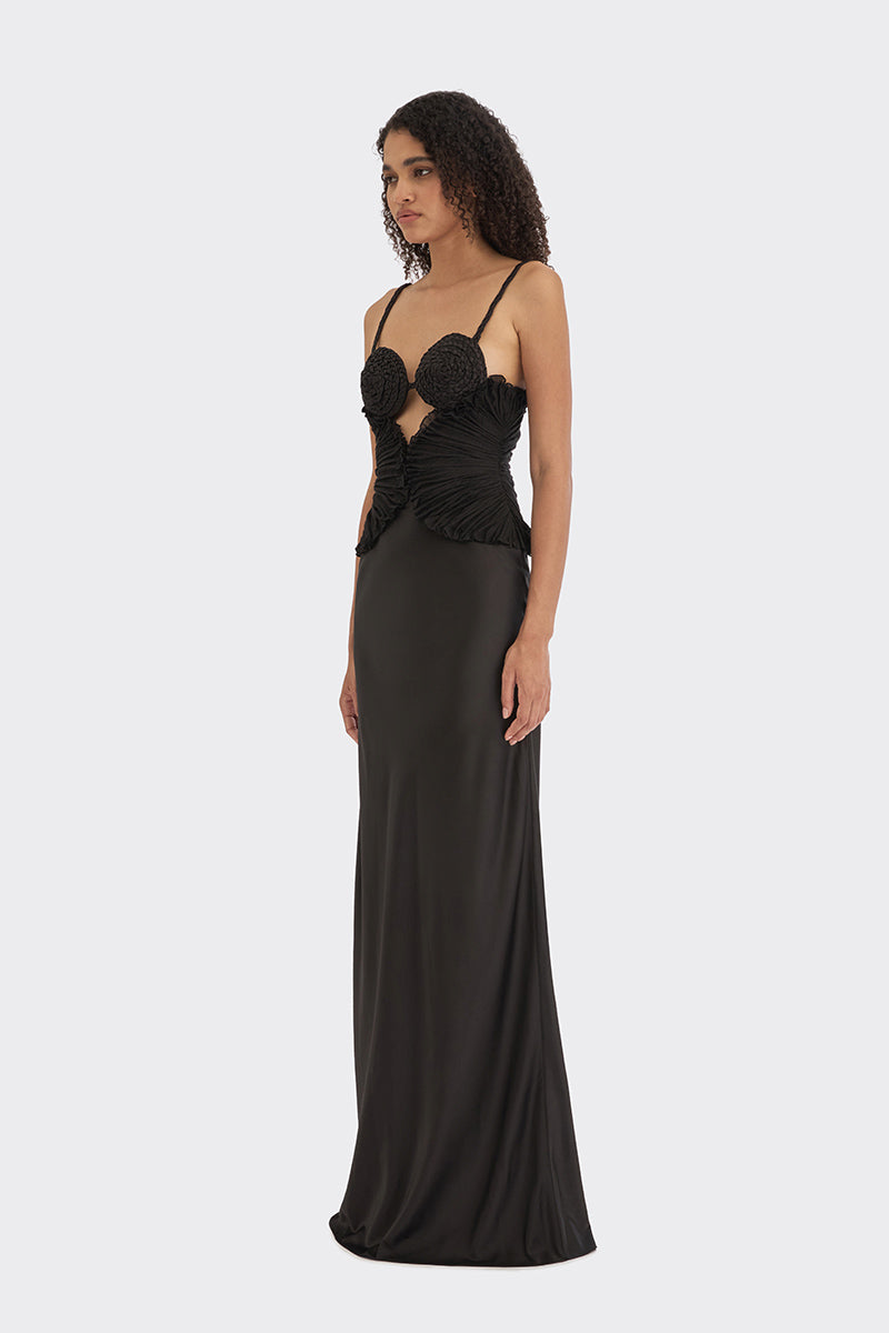 Black spiral lotus leaf maxi dress by Stolen Stores featuring flowing fabric and elegant design.