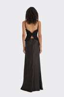 Black spiral lotus leaf maxi dress by Stolen Stores, featuring flowing fabric and elegant design, shown on a model.