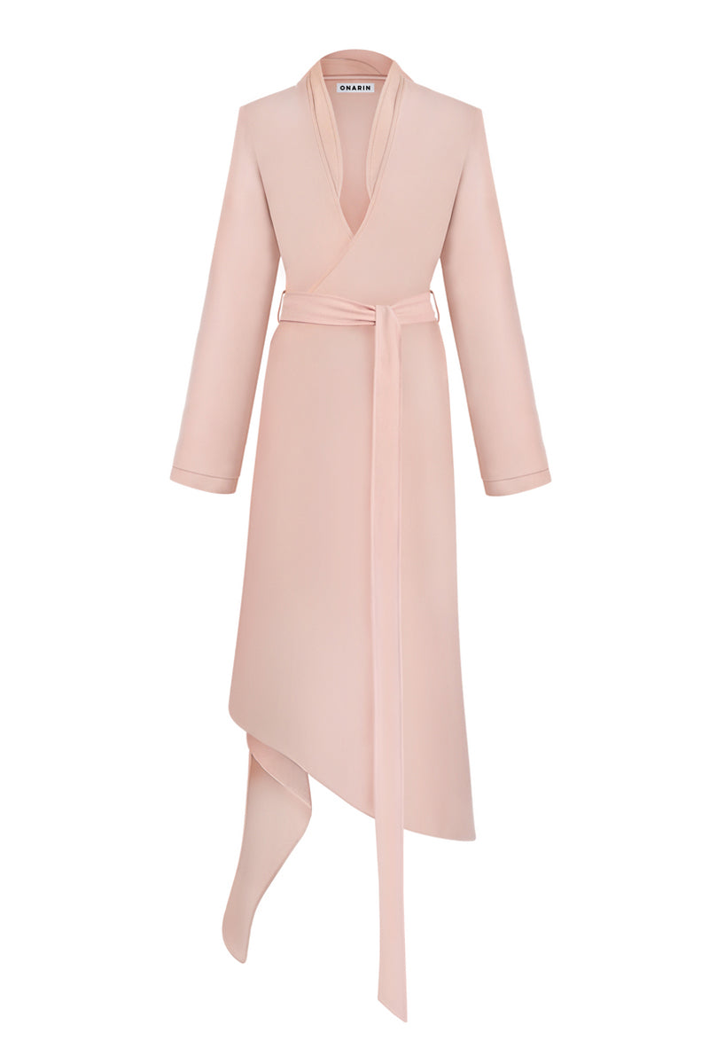 Dusty pink spiral wrap coat by Stolen Stores, featuring a unique spiral design and cozy, stylish fit.