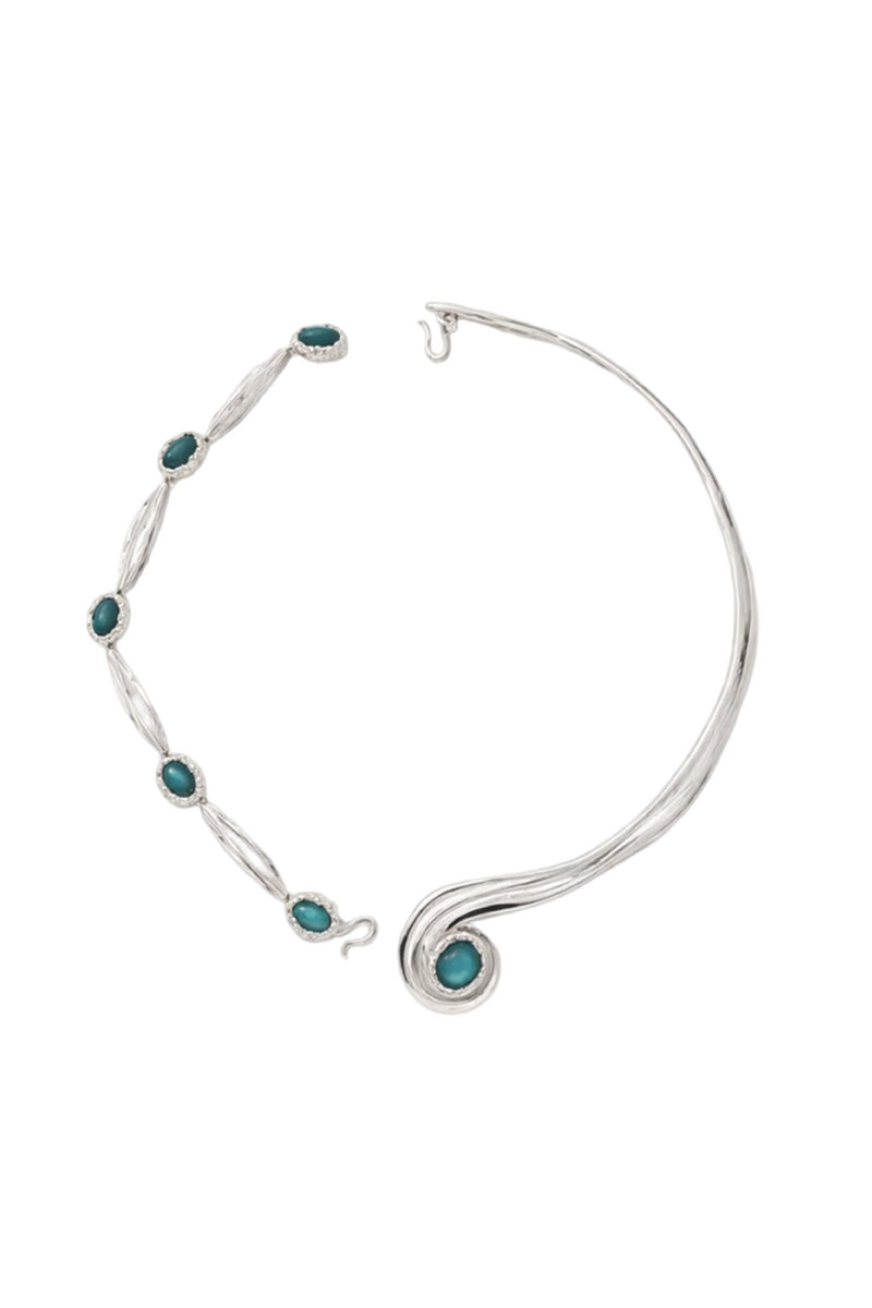 Rhodium-plated spiral necklace by Jude Benhalim featuring an interchangeable blue pendant on a sleek chain.