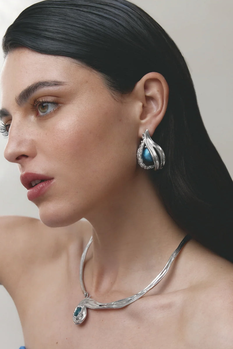 Blue spiral necklace by Jude Benhalim featuring an interchangeable design and a polished rhodium finish.