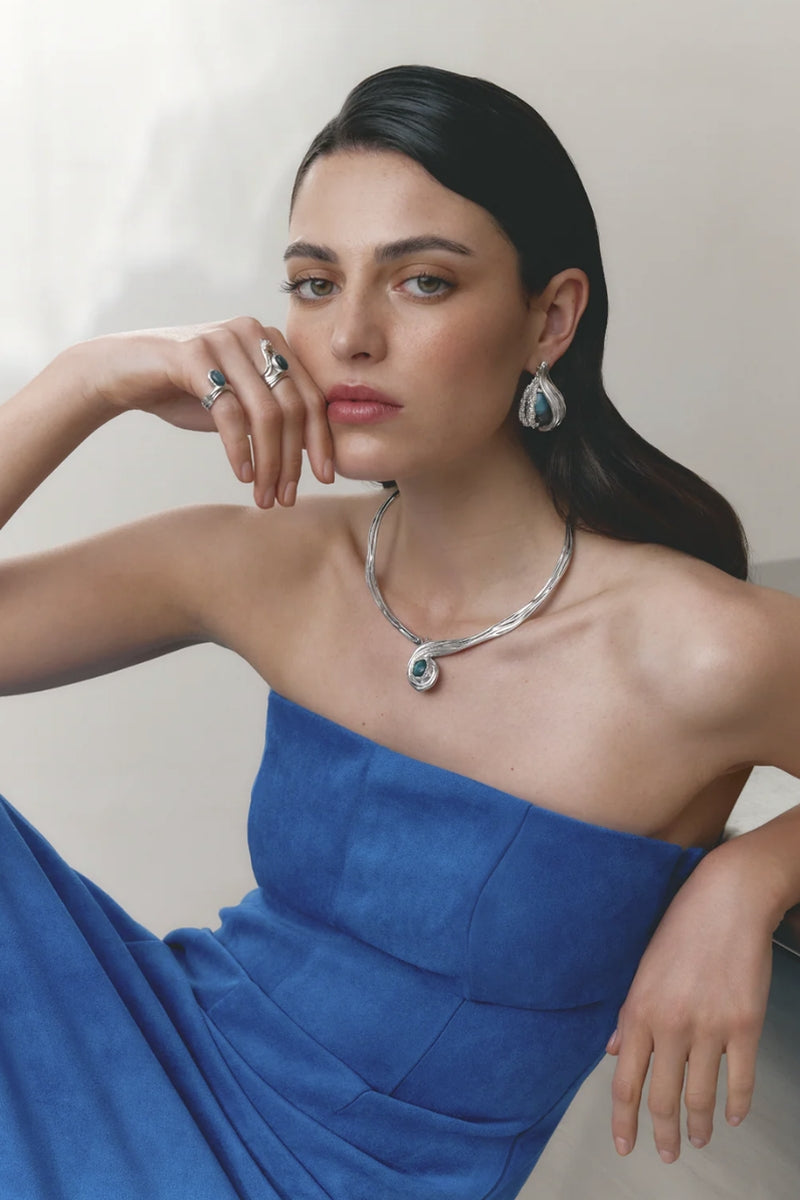 Blue rhodium spiral necklace by Jude Benhalim, featuring an interchangeable design and elegant spiral pattern.