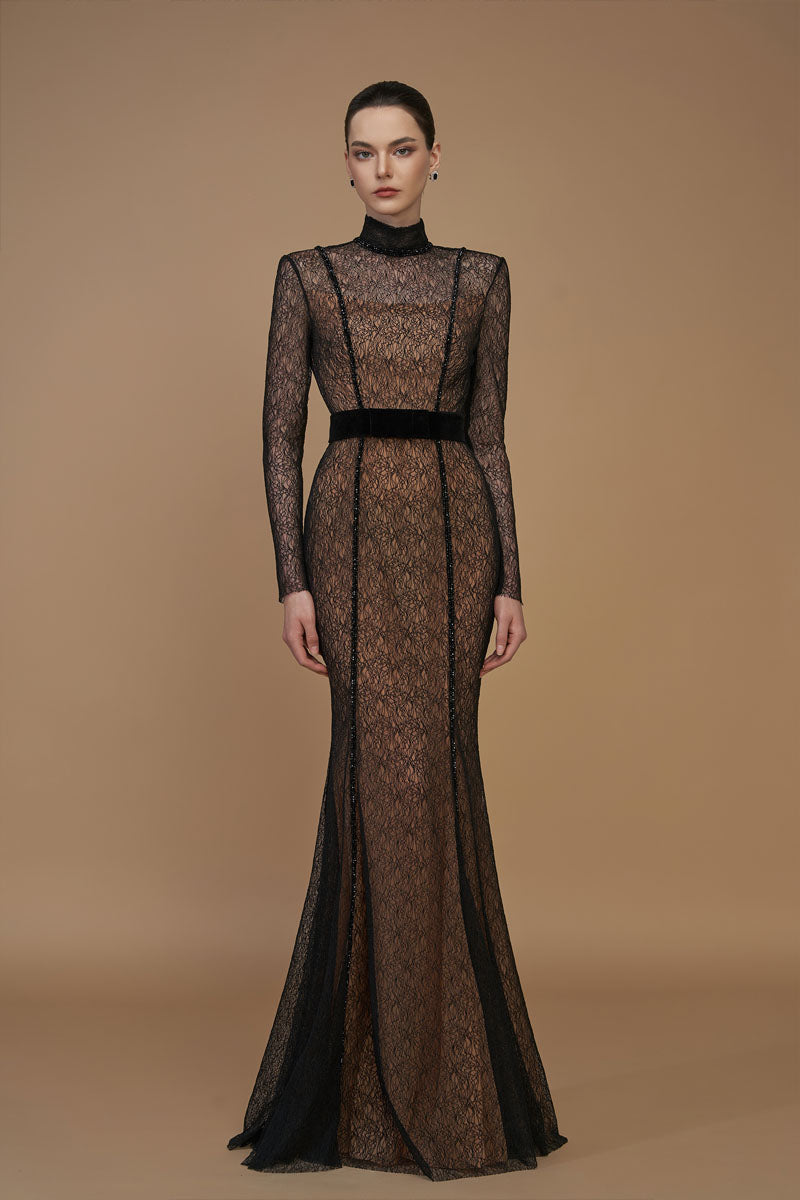 Black mermaid gown with stand collar, lace bodice, and velvet skirt by I.H.F, shown with long sleeves and elegant silhouette.