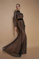 Black mermaid gown with stand collar, long sleeves, lace guipure details, and Lyon velvet fabric by I.H.F.