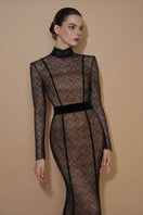 Black mermaid gown by I.H.F featuring vine guipure lace and Lyon velvet with a stand collar and long sleeves.