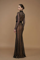 Black mermaid gown with stand collar, long sleeves, lace bodice, and Lyon velvet fabric by I.H.F. Elegant evening dress.