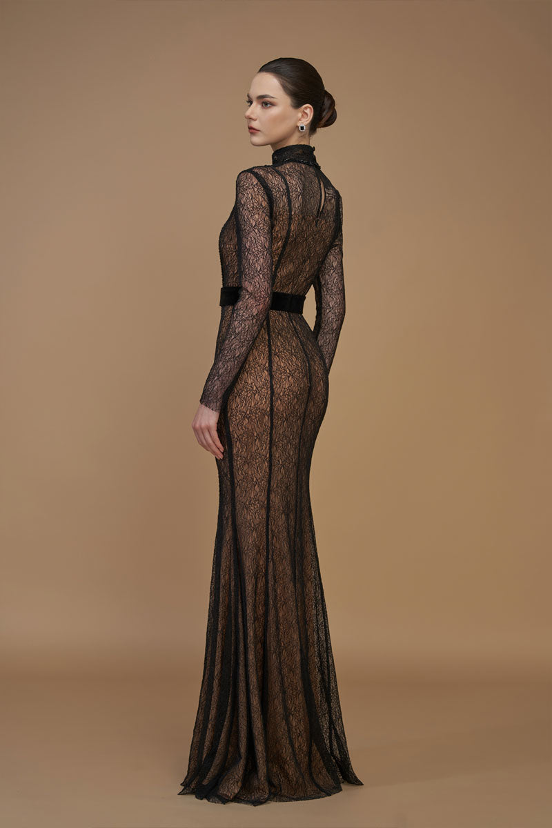 Black mermaid gown with stand collar, long sleeves, lace bodice, and Lyon velvet fabric by I.H.F. Elegant evening dress.