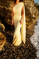 Rayane Bacha Stellamaris gown in Butter Yellow, elegant floor-length dress with a flowing silhouette and delicate fabric.