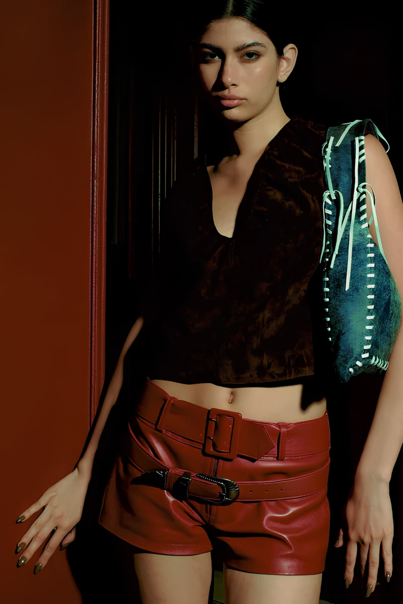 Red Sterling leather belted shorts by Double A featuring a stylish waistband and tailored fit, perfect for casual or chic outfits.