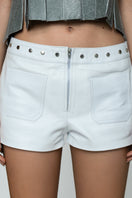 White Sterling Leather Shorts by Double A, showcasing a sleek fit and smooth leather texture on a mannequin.