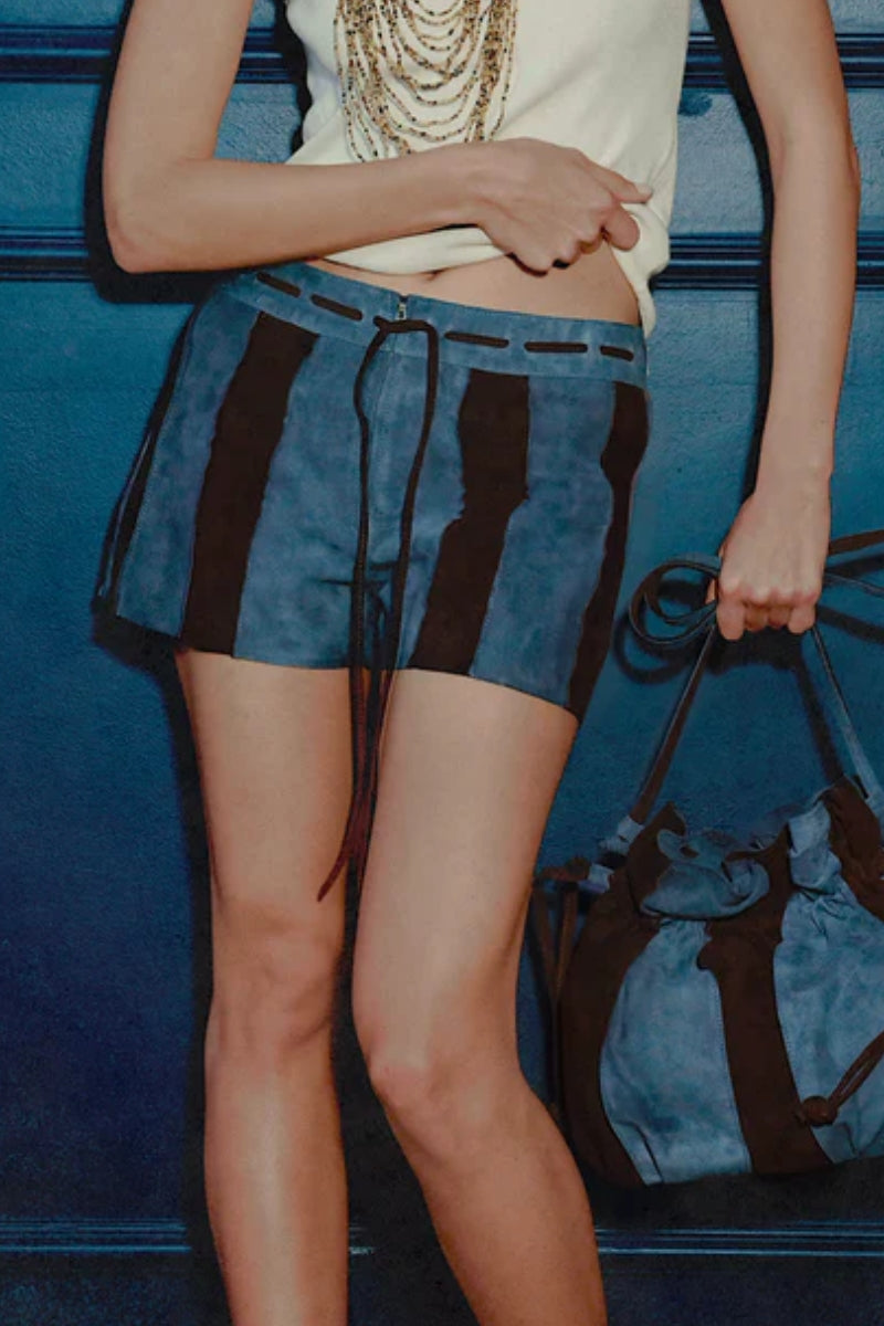 Blue Sterling suede striped shorts by Double A, featuring a relaxed fit and stylish design, shown on a model.