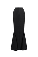 Black Stillness Bloom jacket and mermaid skirt co-ords by Tiny Ink, featuring sleek, fitted design and stylish fabric details.