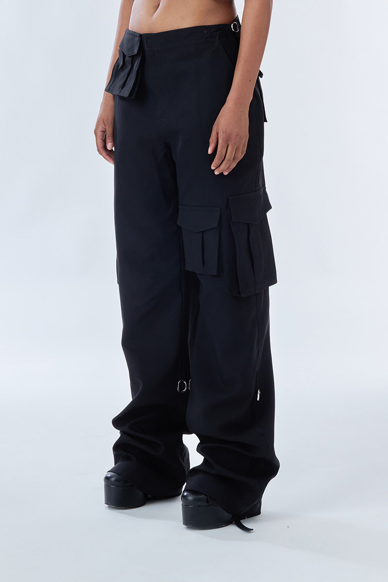 Black Stolen cargo pants with multiple pockets and relaxed fit, stylish and functional casual pants by Stolen Stores.