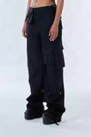 Black Stolen cargo pants with multiple pockets and relaxed fit, stylish and functional casual pants by Stolen Stores.
