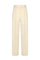 Beige straight-leg trousers by Tayfun Kaba, featuring a tailored fit and clean design, shown on a model.
