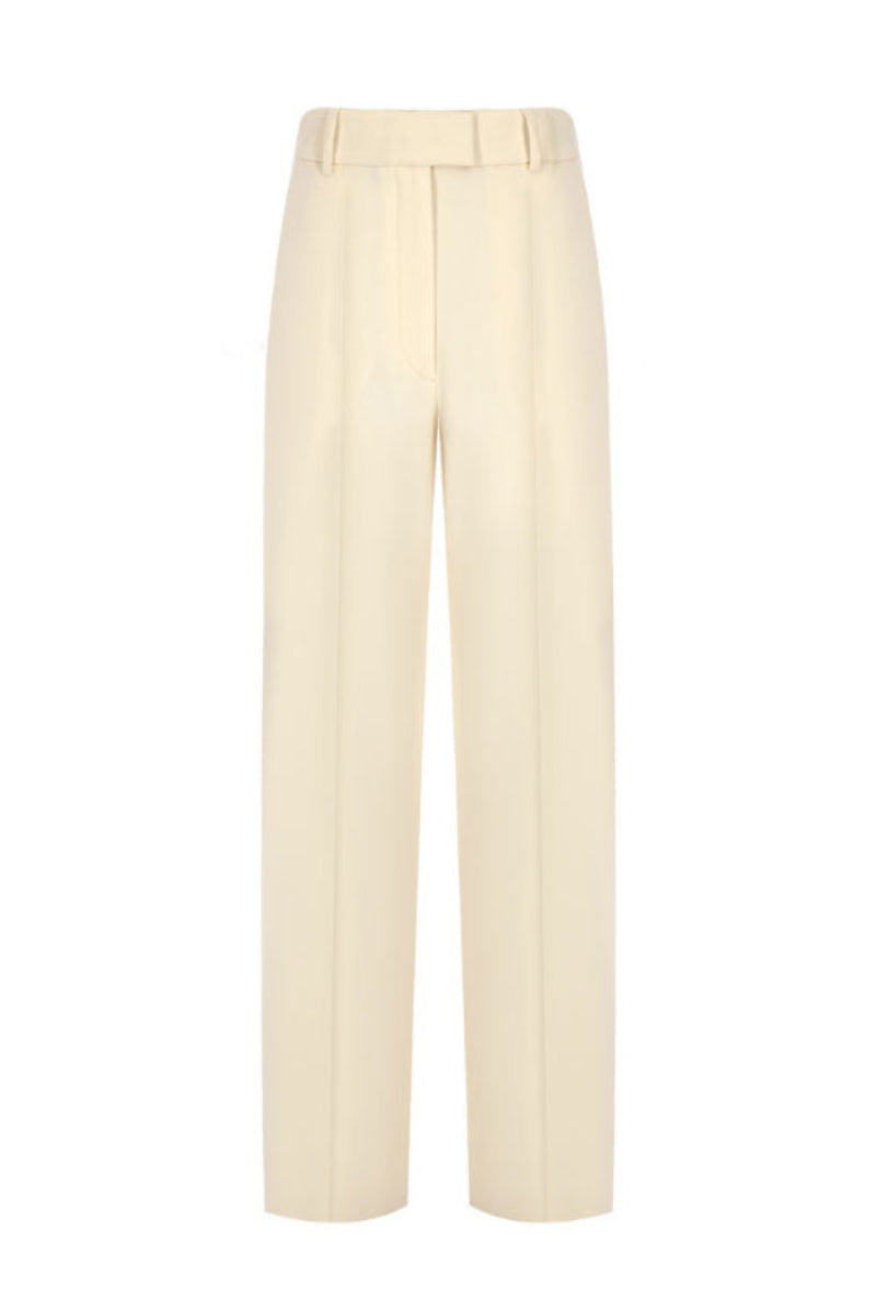 Beige straight-leg trousers by Tayfun Kaba, featuring a tailored fit and clean design, shown on a model.