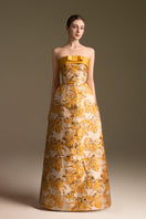 Yellow jacquard ballgown by I.H.F with strapless design and draped bow detail in agate silk.