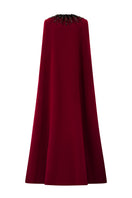 Elegant strapless ruby crepe and Lyon velvet gown with a long cape, designed by I.H.F, featuring a sleek column silhouette.