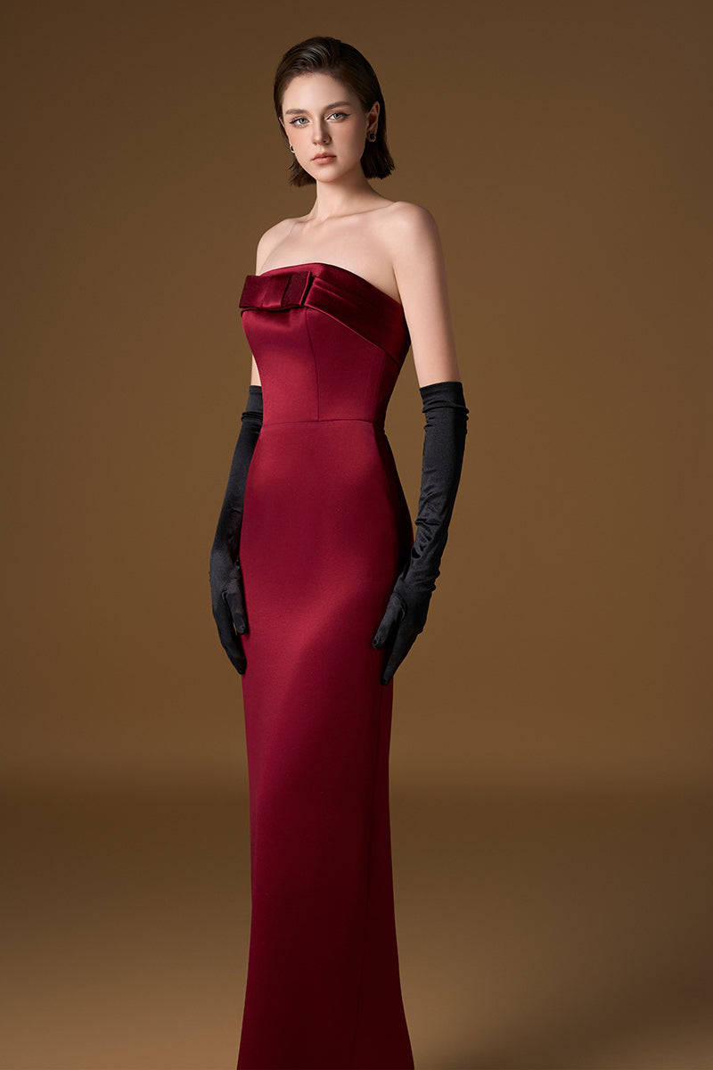 I.H.F red crepe silk lined strapless bustier column gown with a sleek silhouette and elegant design.