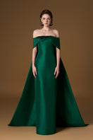 Green I.H.F taffeta silk-lined gown featuring a strapless bustier, draped off-shoulder details, and a column silhouette.