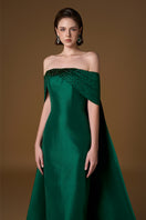 Elegant green taffeta gown by I.H.F featuring a strapless bustier and draped off-shoulder details in a sleek column silhouette.