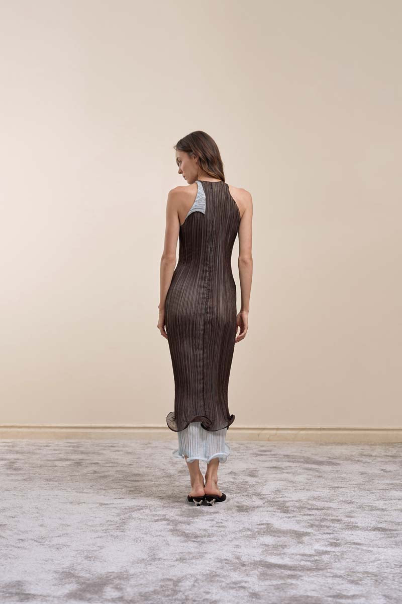 Back view of YASSMIN SALEH Strata Dress in brown, a stylish midi dress with a flowing silhouette and elegant design.