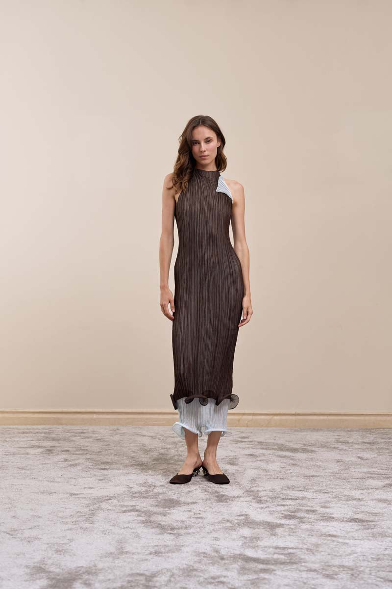 YASSMIN SALEH Strata Dress in brown, stylish midi dress with a fitted bodice and flowing skirt, front view.