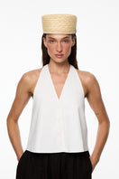 LE SH KA straw pillbox hat with a sleek, structured design, perfect for stylish summer accessories.