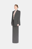Gray striped Jacques blazer by Montsand, tailored fit, featuring classic lapel and button closure, displayed on a hanger.