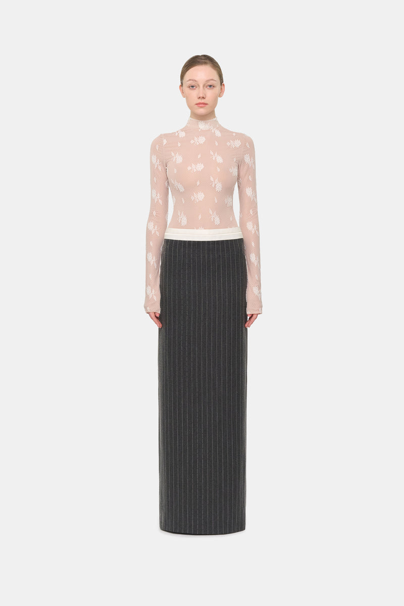 Gray striped Jacques maxi skirt by Montsand, flowing fabric with bold vertical stripes, stylish and comfortable for casual wear.
