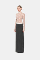 Gray striped Jacques maxi skirt by Montsand, flowing fabric with a stylish pattern, shown on a model.