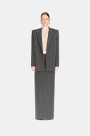 Montsand striped Jacques maxi skirt with bold vertical stripes, flowing fabric, and high waist design.