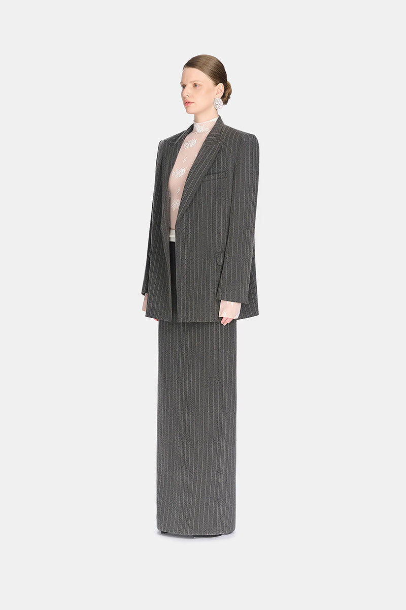 Montsand striped Jacques maxi skirt featuring bold vertical stripes and a flowing silhouette, perfect for casual or dressy occasions.